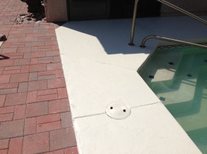 Decorative Concrete Resurfacing Gives the Pool Deck a Modern, Easy on the Feet Finish 